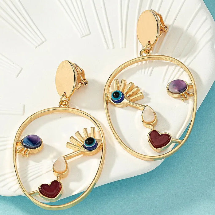 Abstract Face Pendant Earrings
